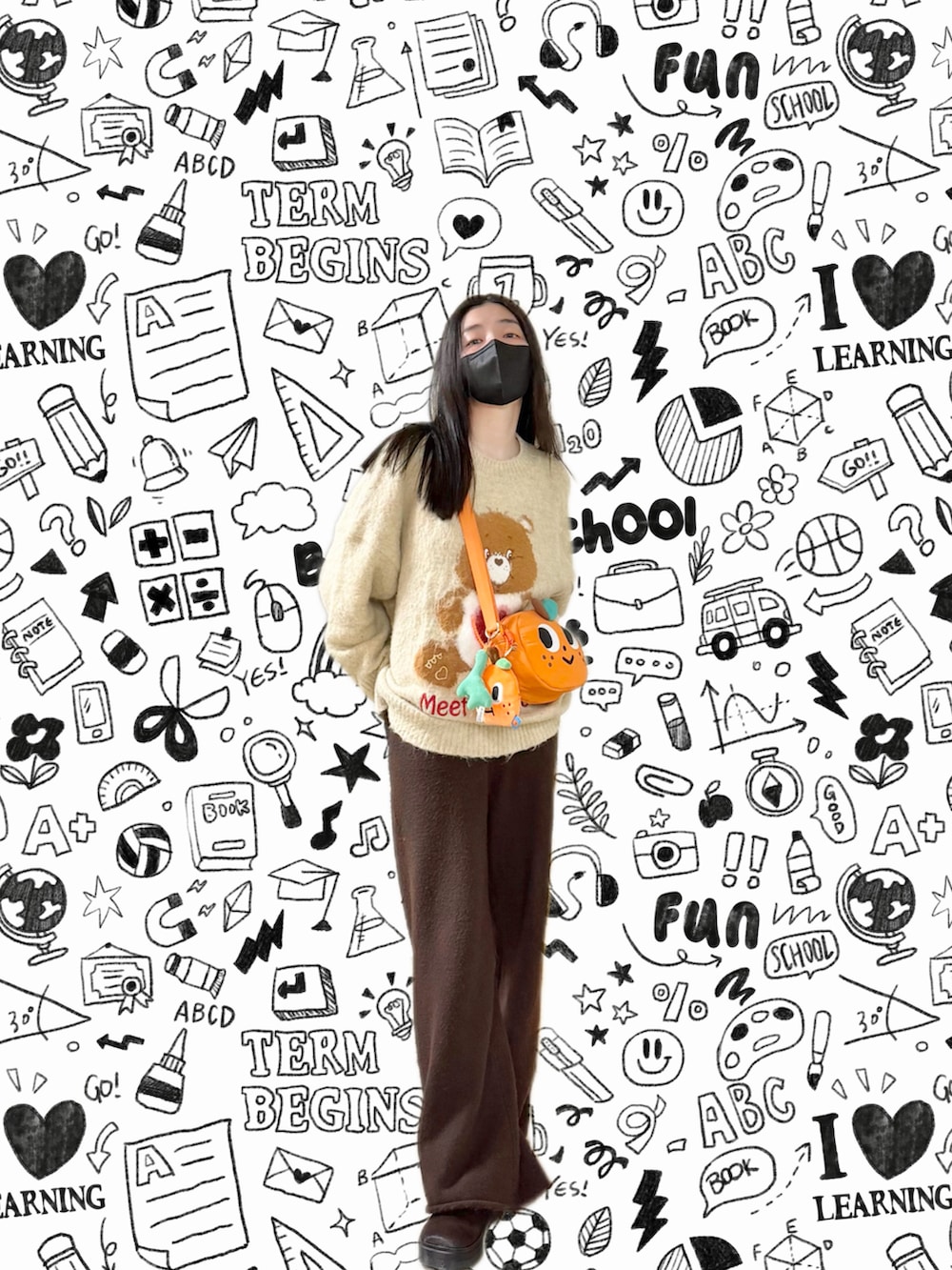 イエロー系のニット/セーター、ブラック系のノーカラージャケット、ブラウン系のその他パンツを着用したレディースの冬コーディネートの2枚目の写真