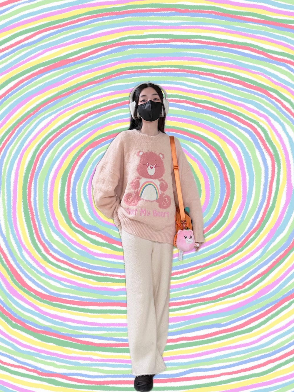 ピンク系のニット/セーター、ブラック系のノーカラージャケット、ベージュ系のパンツを着用したレディースの冬コーディネートの3枚目の写真