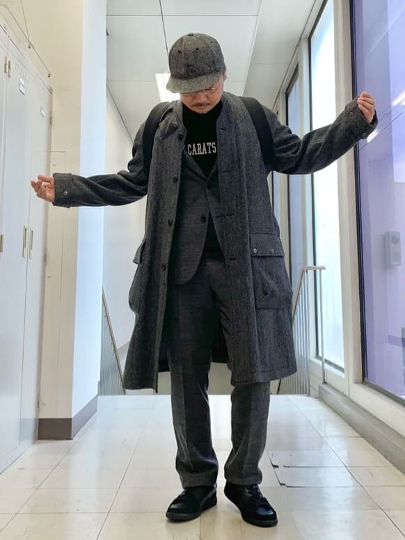ブラック系のバックパック/リュックを着用したメンズの冬コーディネートの7枚目の写真