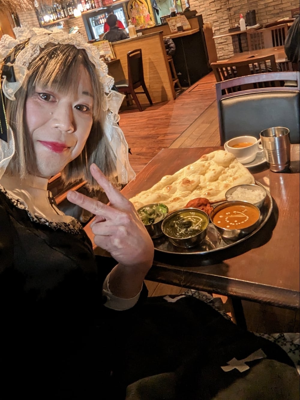「休日スタイル、ストリートコーデ、ゴスロリ、お出かけコーデ、ブラックコーデ、LGBT、MTF」｜「夢展望のアイテム（ダウンジャケット/コート、ブラック系）」を使った、ななお(七緒)さん（レディース・169cm）の冬コーディネートの5枚目の写真