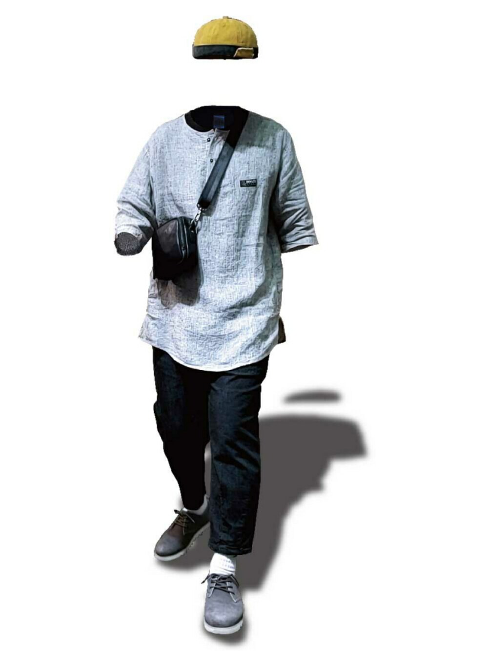 ブラック系のデニムパンツを着用したメンズの春コーディネートの2枚目の写真