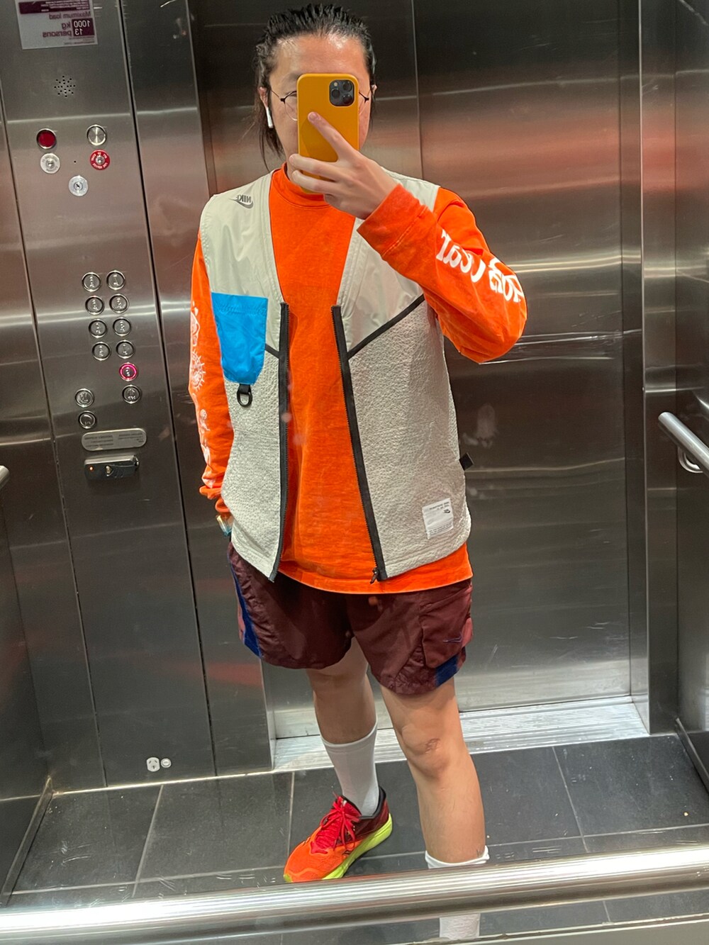 「NIKE、NIKEACG、running」｜「NIKE ACGのアイテム（Tシャツ/カットソー、オレンジ系）」を使った、李瑞可さん（メンズ・170cm）の春コーディネートの2枚目の写真