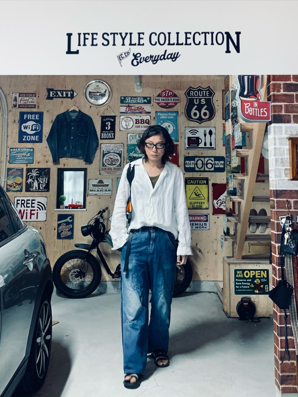 ブルー系のデニムパンツ、ホワイト系のシャツ/ブラウス、ブラック系のシューズを着用したメンズの夏コーディネートの3枚目の写真