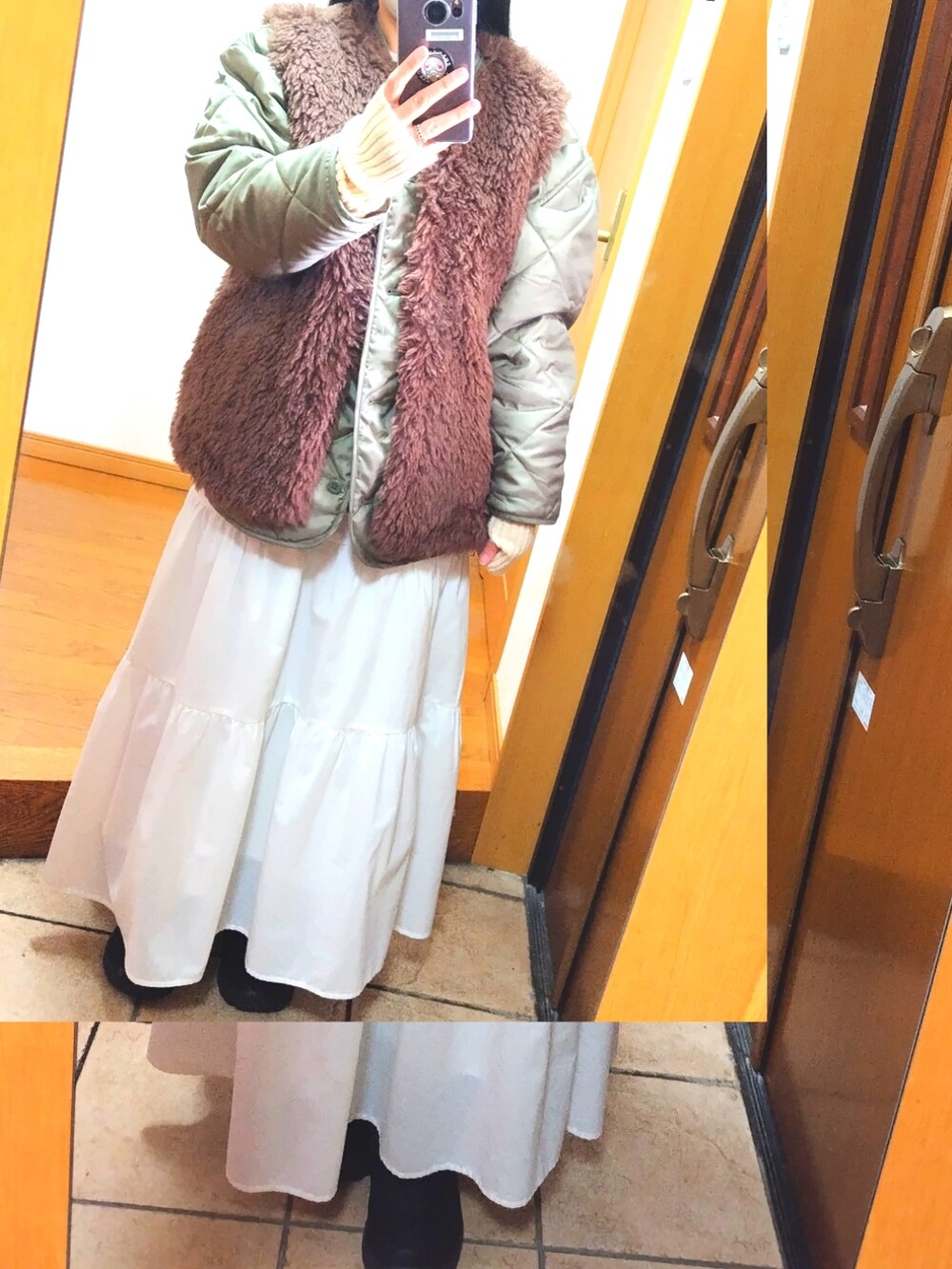 ブラウン系のベスト、グリーン系のノーカラージャケット、ホワイト系のショルダーバッグを着用したレディースの冬コーディネートの2枚目の写真