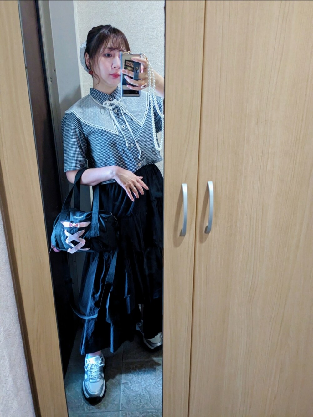 「GUのアイテム（シャツ/ブラウス、ブラック系）」を使った、tarさん（レディース・164cm）の夏コーディネートの2枚目の写真