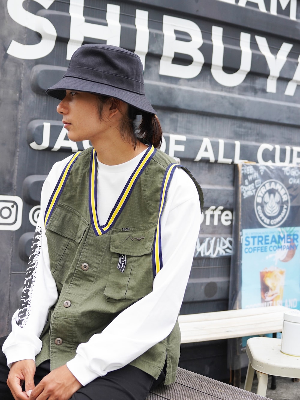 「チェック、アウトドアスタイル、パステルカラー、秋コーデ、バケットハット」｜「MANASTASHのMANASTASH/マナスタッシュ　FLEX CLIMBER WIDE SHORTS フレックスクライマーワイドショーツ　7126030（その他パンツ、ブラック系）」を使った、yusuke061019さん（メンズ・173cm）の秋コーディネートの2枚目の写真