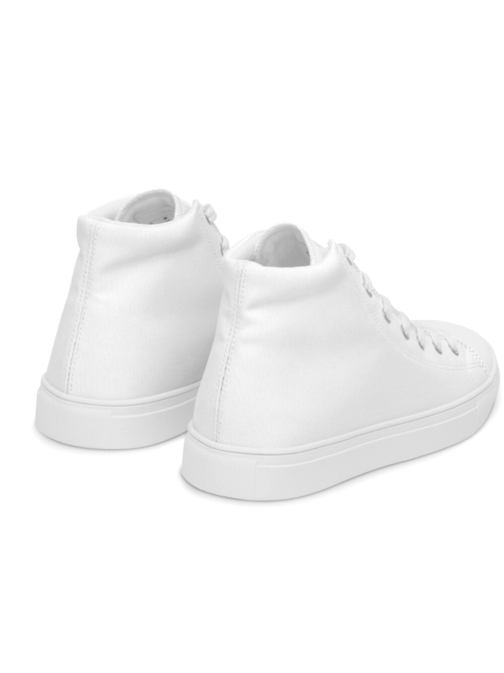 ブルー系のデニムパンツ、ホワイト系のスニーカーを着用したレディースの冬コーディネートの5枚目の写真