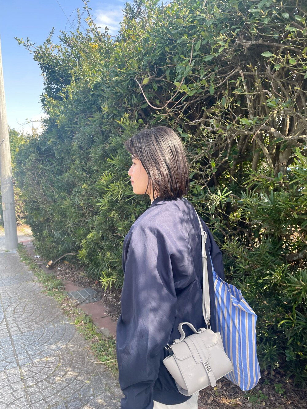 「卒業旅行」｜「A part byのPコクーンボリュームパンツ（その他パンツ、ホワイト系）」を使った、しゃかりき・リラックスさん（レディース・159cm）の春コーディネートの2枚目の写真