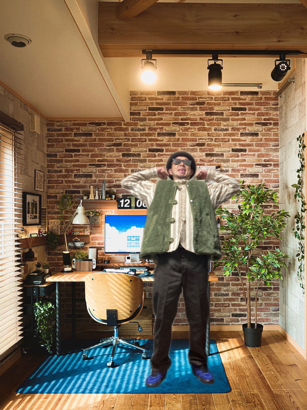 グレー系のその他アウター、ブラウン系のチノパンツ、ブルー系のスニーカーを着用したメンズの冬コーディネートの3枚目の写真