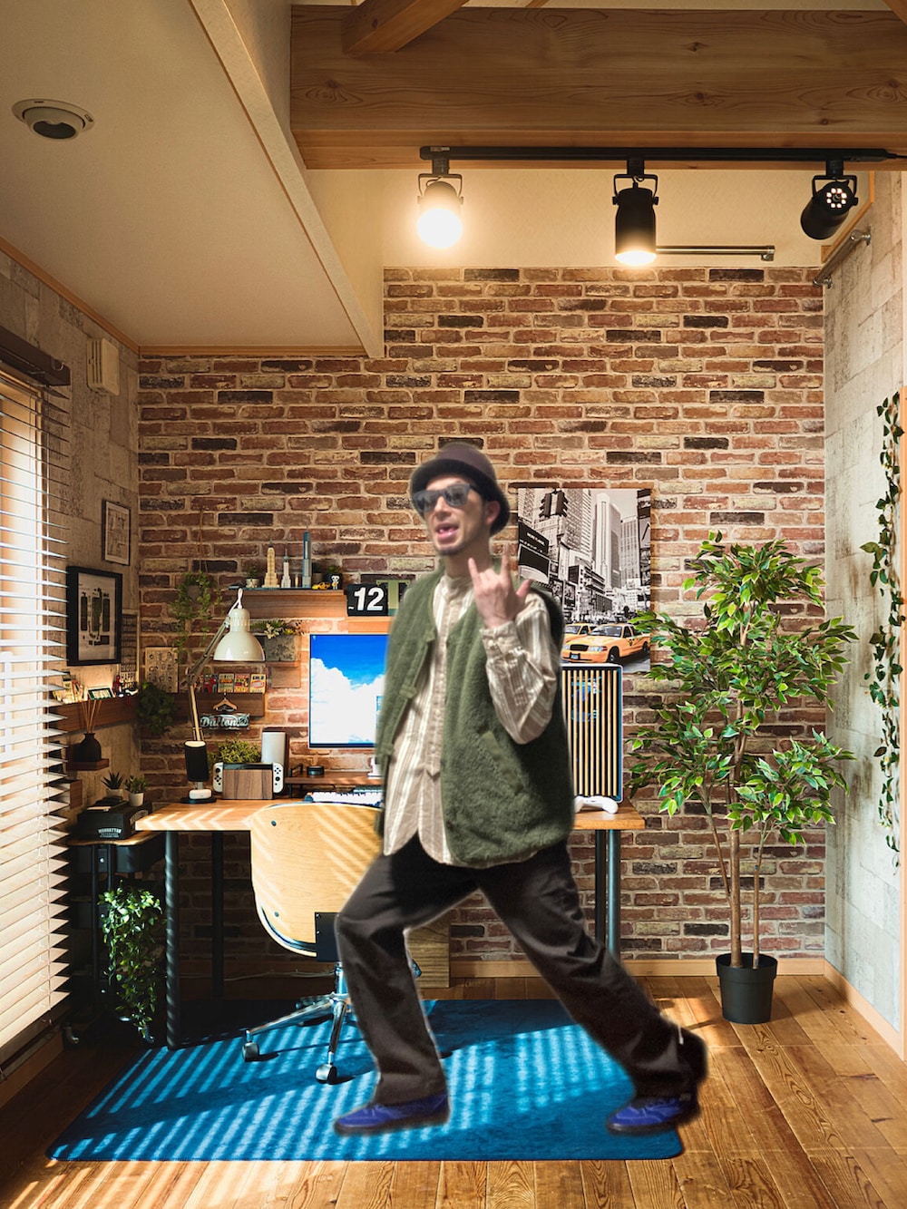 グレー系のその他アウター、ブラウン系のチノパンツ、ブルー系のスニーカーを着用したメンズの冬コーディネートの4枚目の写真