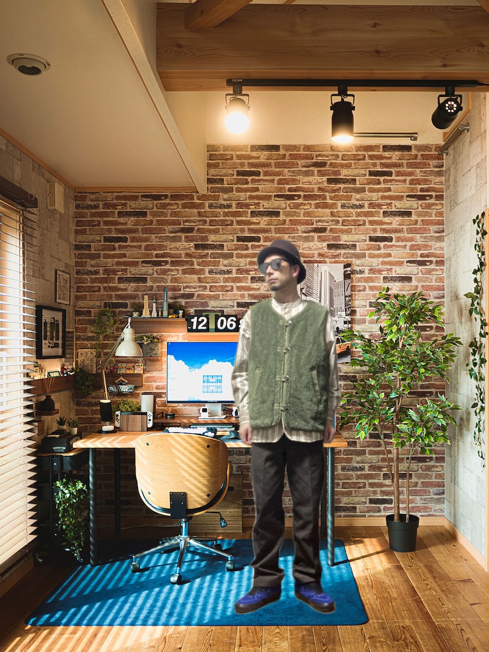 グレー系のその他アウター、ブラウン系のチノパンツ、ブルー系のスニーカーを着用したメンズの冬コーディネートの2枚目の写真