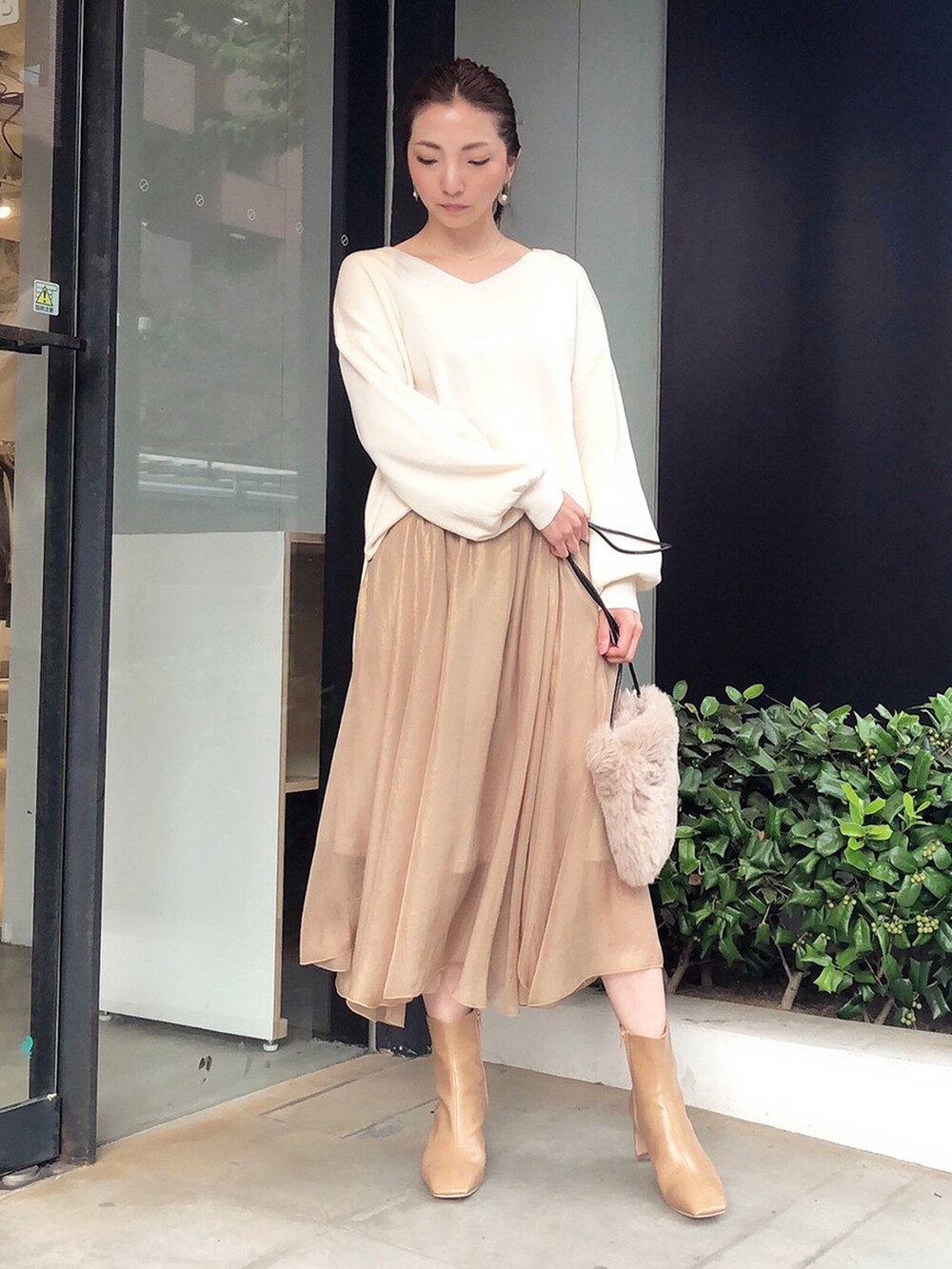 レディースの秋コーディネートの2枚目の写真