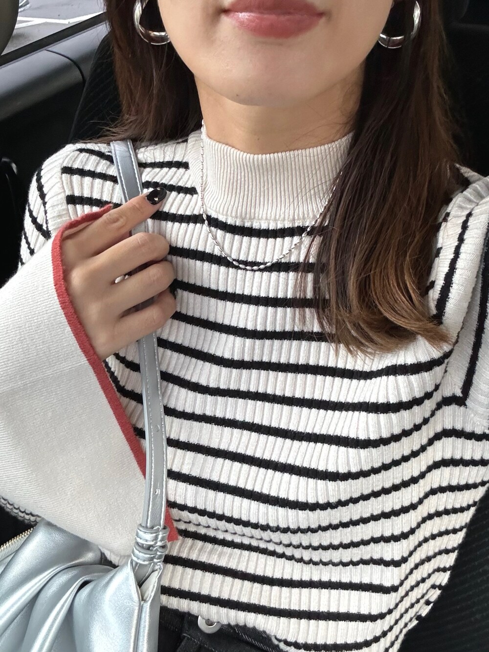 その他のニット/セーターを着用したレディースの秋コーディネートの3枚目の写真