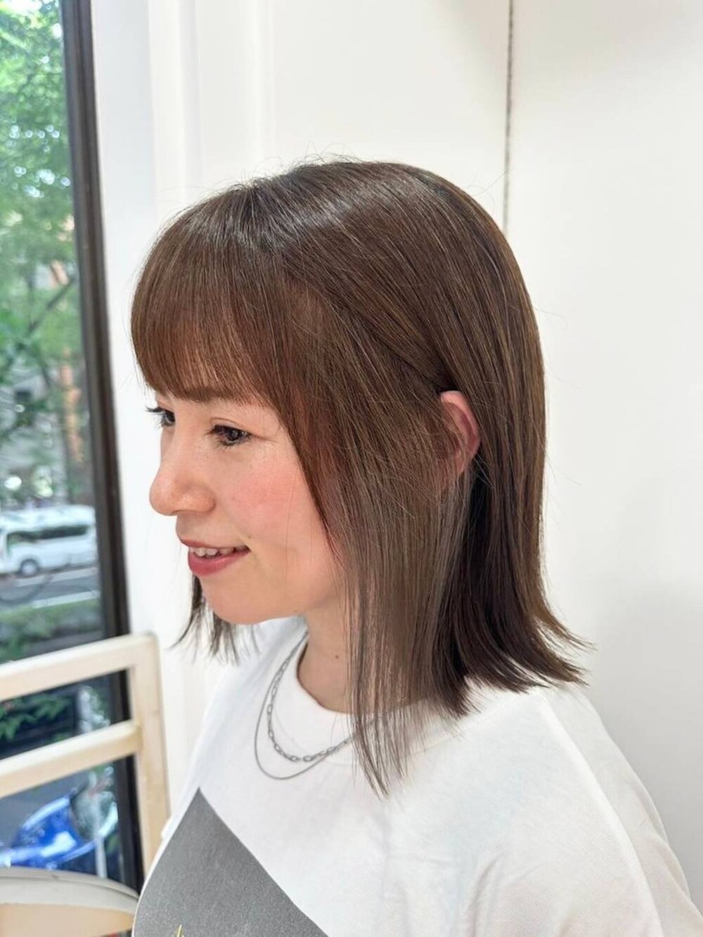 その他のTシャツ/カットソー、シルバー系のネックレスを着用したレディースの夏コーディネートの3枚目の写真