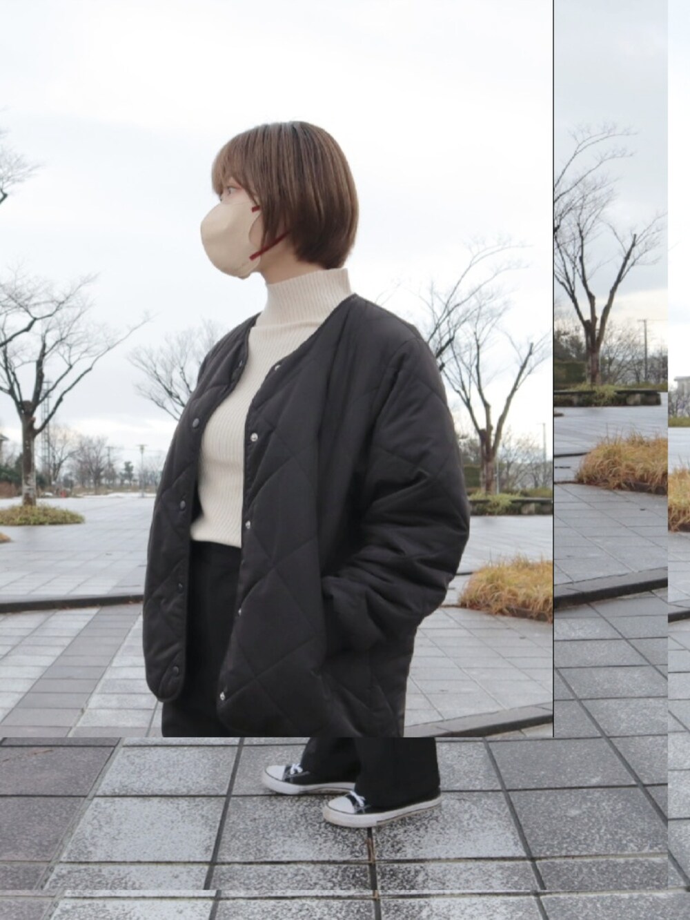 ブラック系のその他アウター、ホワイト系のニット/セーター、ブラック系のパンツを着用したレディースの冬コーディネートの4枚目の写真