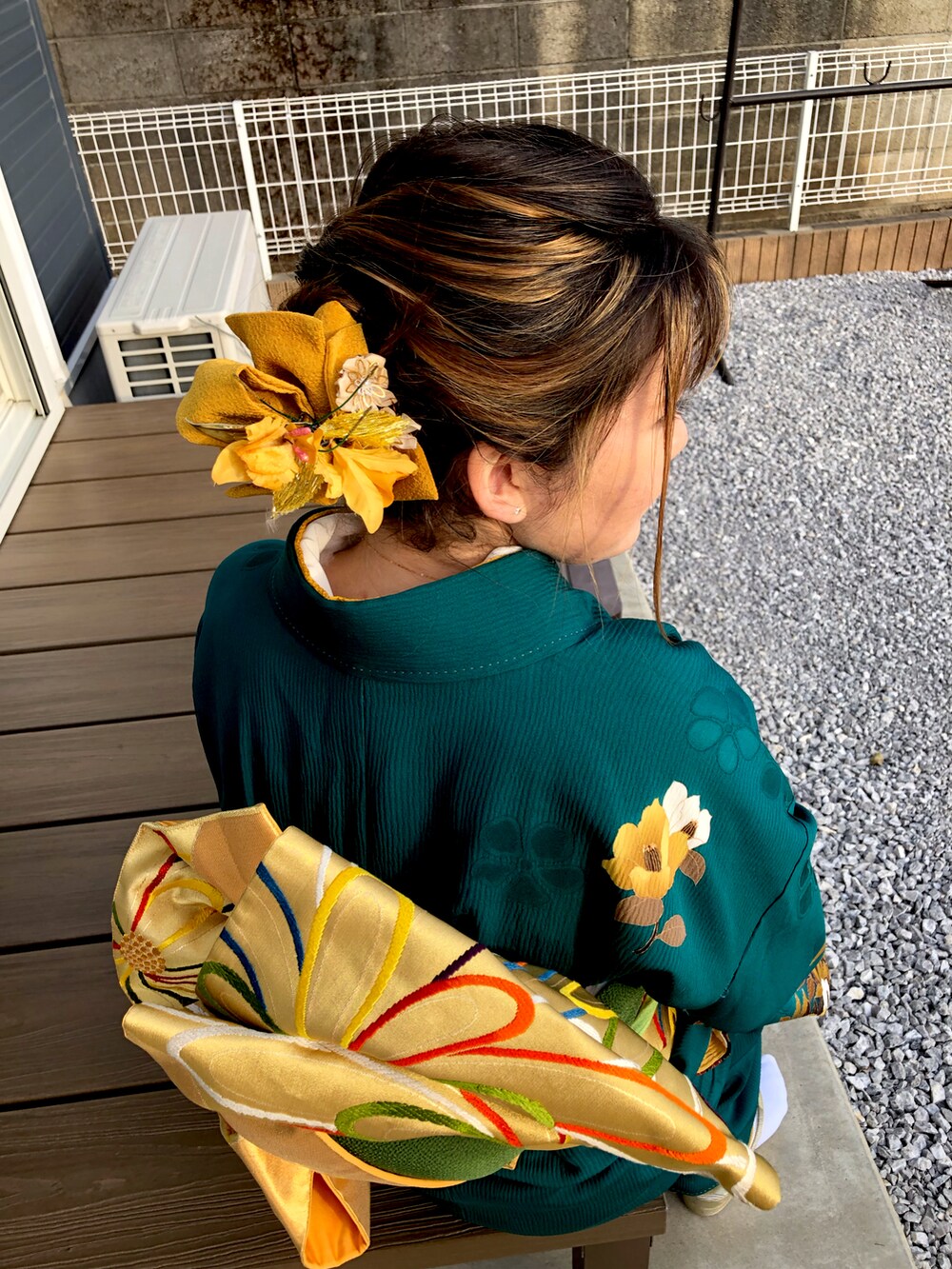 グリーン系のその他を着用したレディースの冬コーディネートの4枚目の写真