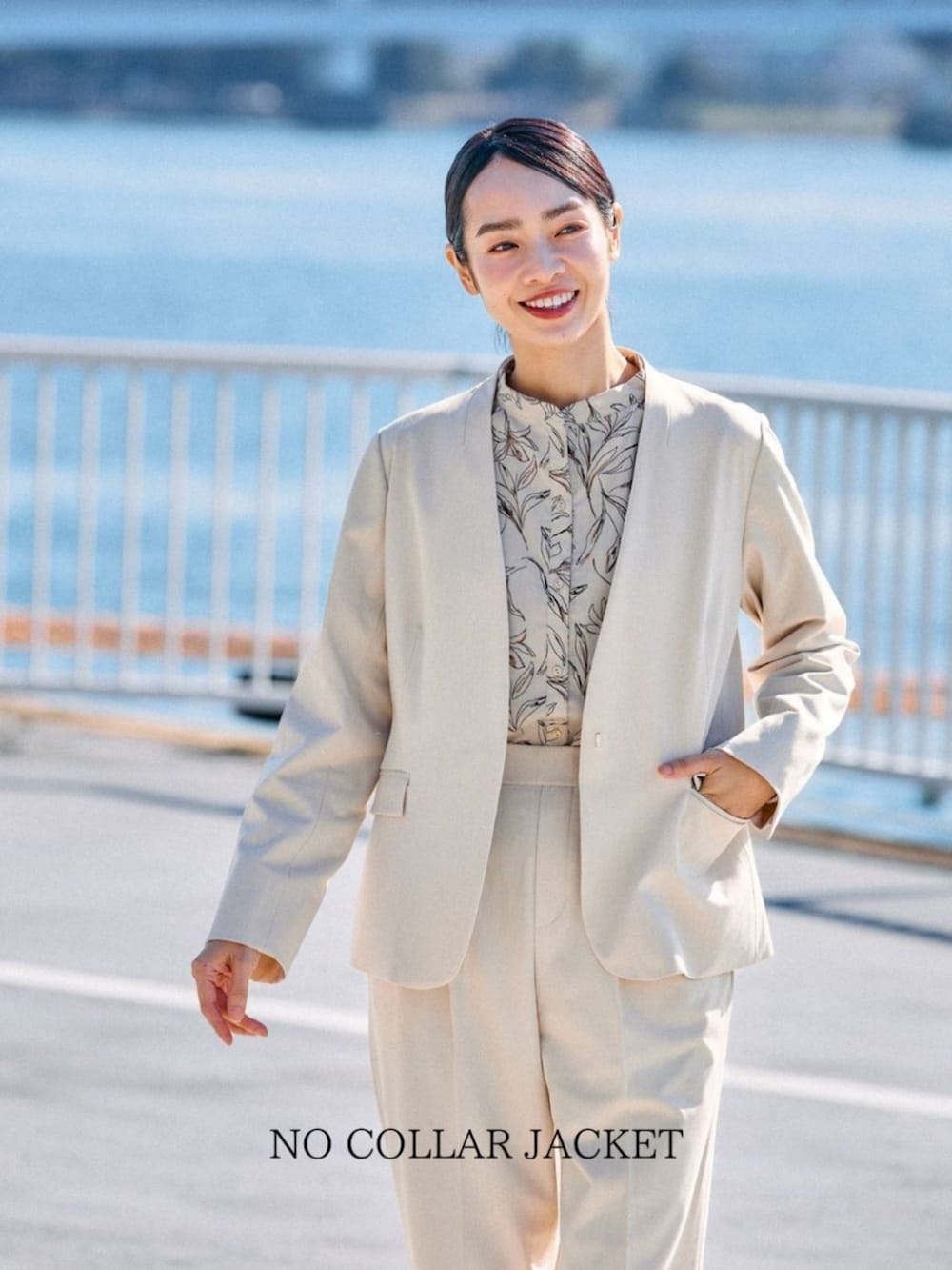 ベージュ系のその他パンツ、ベージュ系のノーカラージャケットを着用したレディースの春コーディネートの2枚目の写真