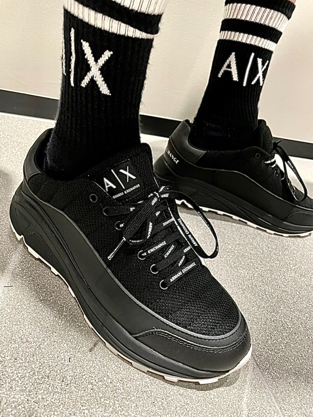 「AXchange、AXchanger、armaniexchange、アルマーニエクスチェンジ、オレンジ、ストリート、オーバーサイズ、腕時計、ラバーバンド、自動巻き」|「ARMANI EXCHANGEの【A|X アルマーニ エクスチェンジ】ロゴ バケットハット(ハット、ブラック系)」を使った、ONI0415さん(メンズ・178cm)の春コーディネートの4枚目の写真