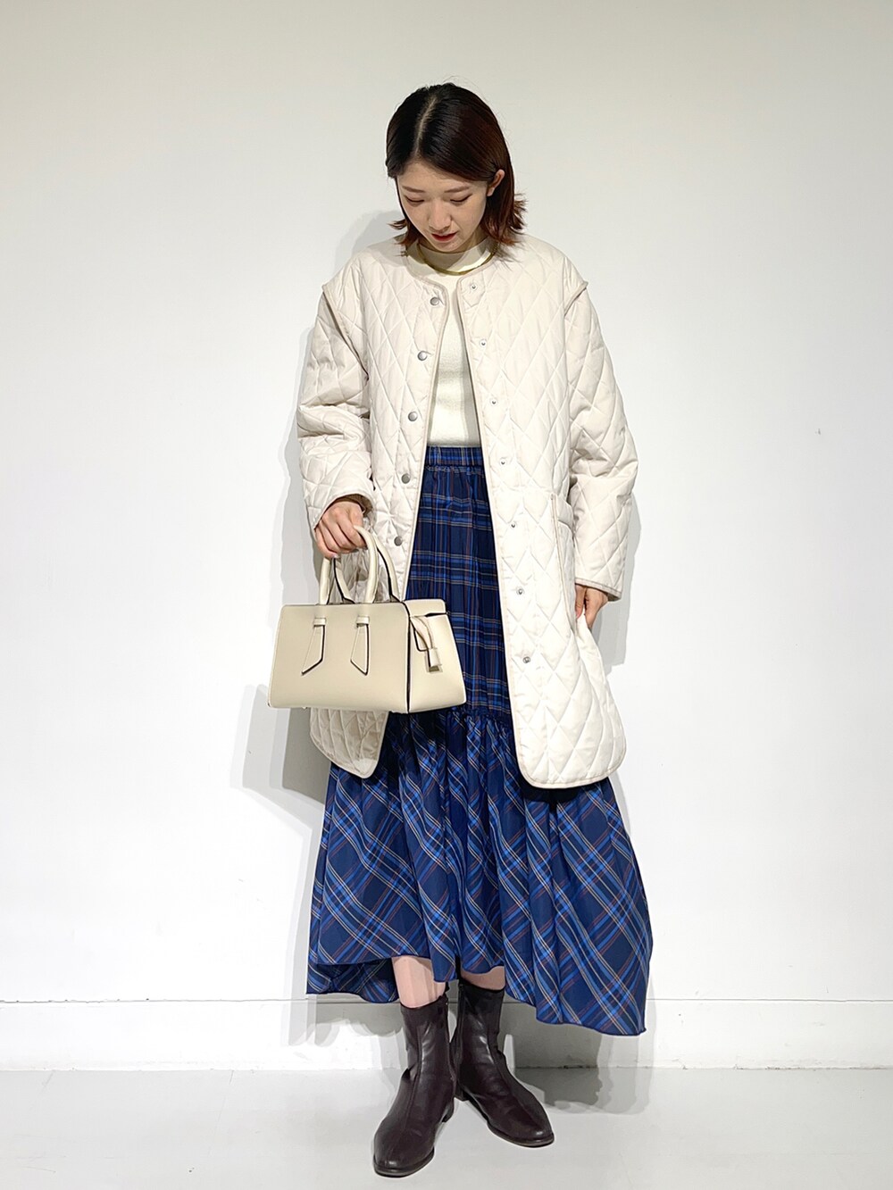 sakiさんの「『UR TECH』キルティングミドルコート（SENSE OF PLACE by URBAN RESEARCH）」を使ったコーディネートの2枚目の写真