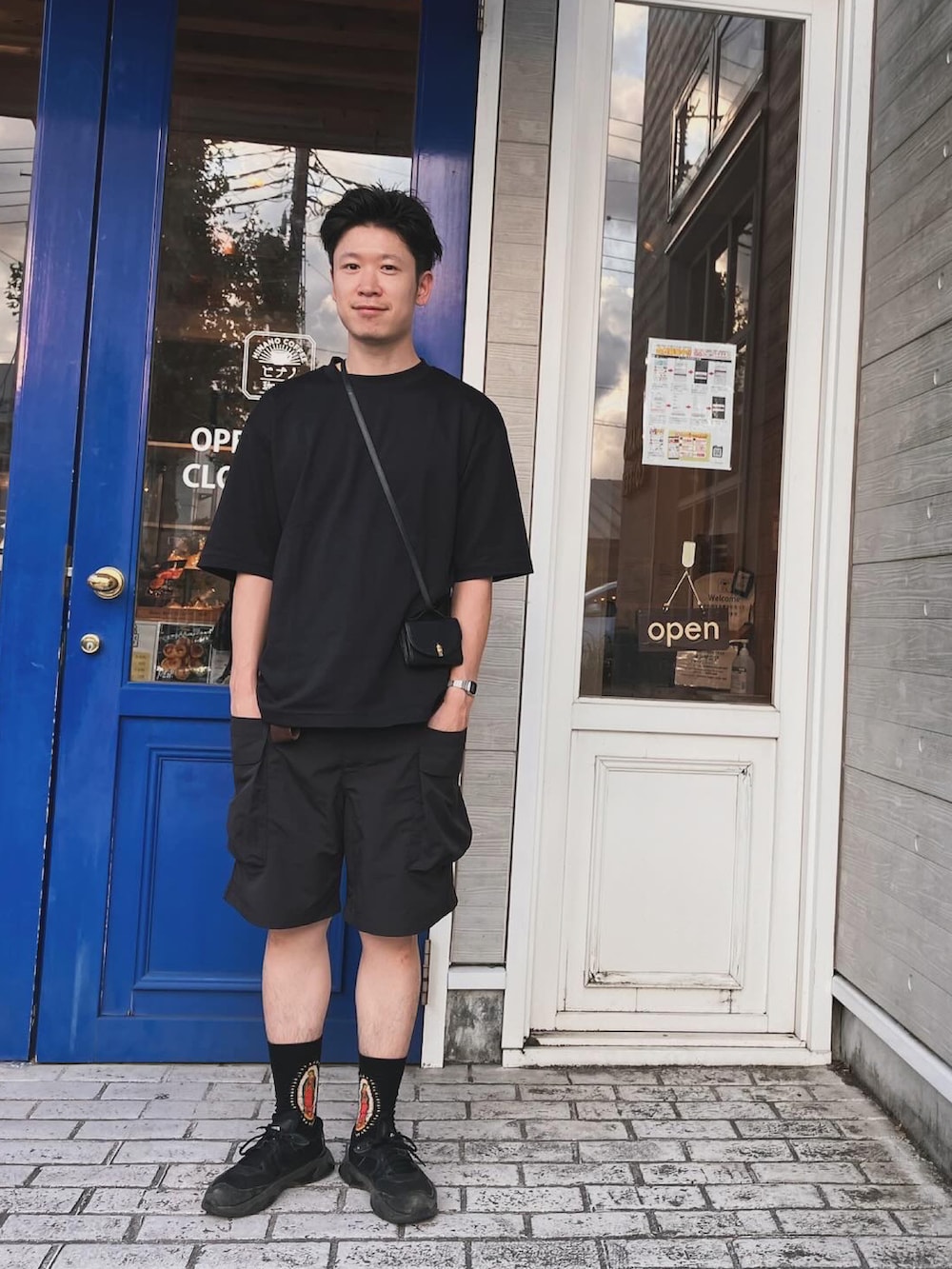 「お出かけコーデ、大人カジュアル、低身長コーデ、シンプルコーデ、ラフ、モノトーン、アウトドア、パンツスタイル、スポーツミックス、ユニクロ、UNIQLO、スニーカー、PUMA、オールブラック」｜「Portのマリア グラフィック ジャガード ソックス / クルーソックス（ソックス/靴下、ブラック系）」を使った、YANさん（メンズ・167cm）の夏コーディネートの3枚目の写真