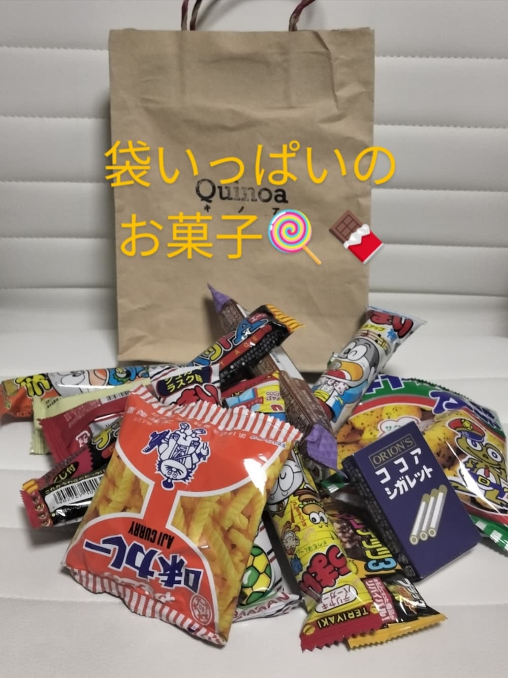 ブルー系のネックウォーマー/スヌードを着用したレディースの冬コーディネートの4枚目の写真