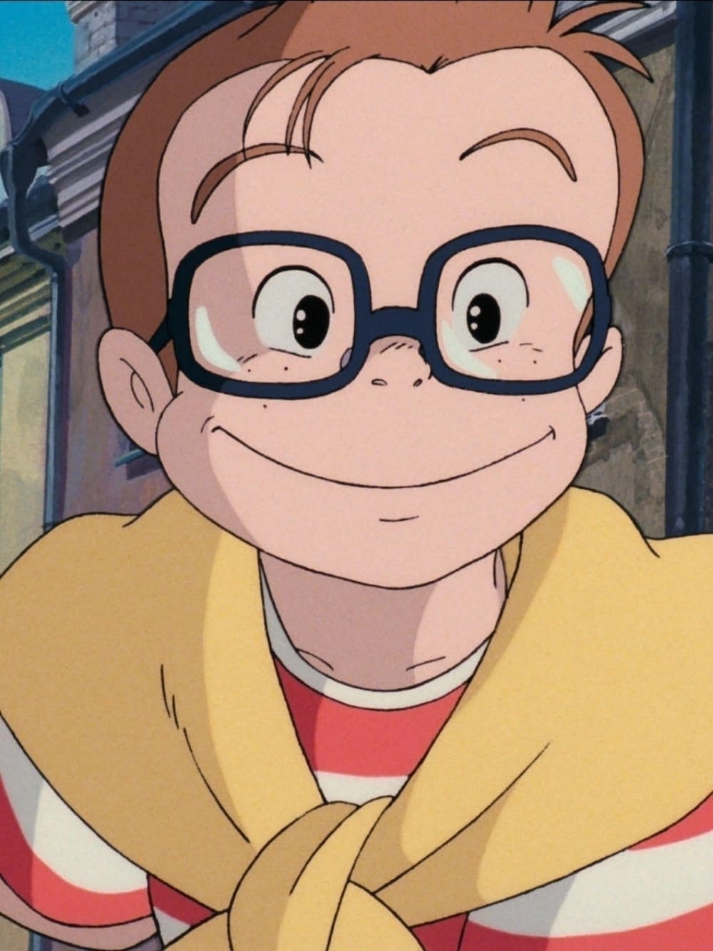 レッド系のニット/セーター、ブルー系のデニムパンツ、ブラック系のドレスシューズを着用したメンズの秋コーディネートの3枚目の写真