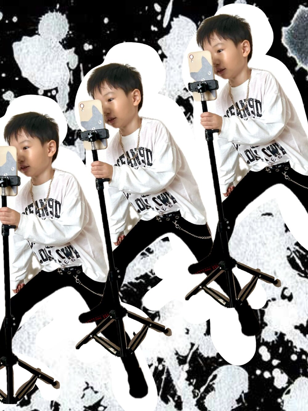 ホワイト系のTシャツ/カットソー、レッド系のTシャツ/カットソー、シルバー系のキーケース/キーアクセサリーを着用したキッズの春コーディネートの2枚目の写真