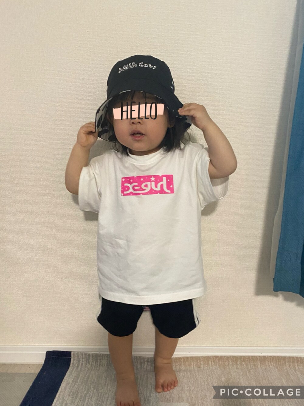 ホワイト系のTシャツ/カットソー、ブラック系のハットを着用したキッズの夏コーディネートの2枚目の写真