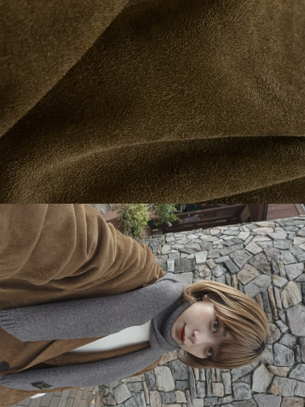 ブラウン系のテーラードジャケット、ホワイト系のトップス、ブラック系のショルダーバッグを着用したレディースの冬コーディネートの2枚目の写真