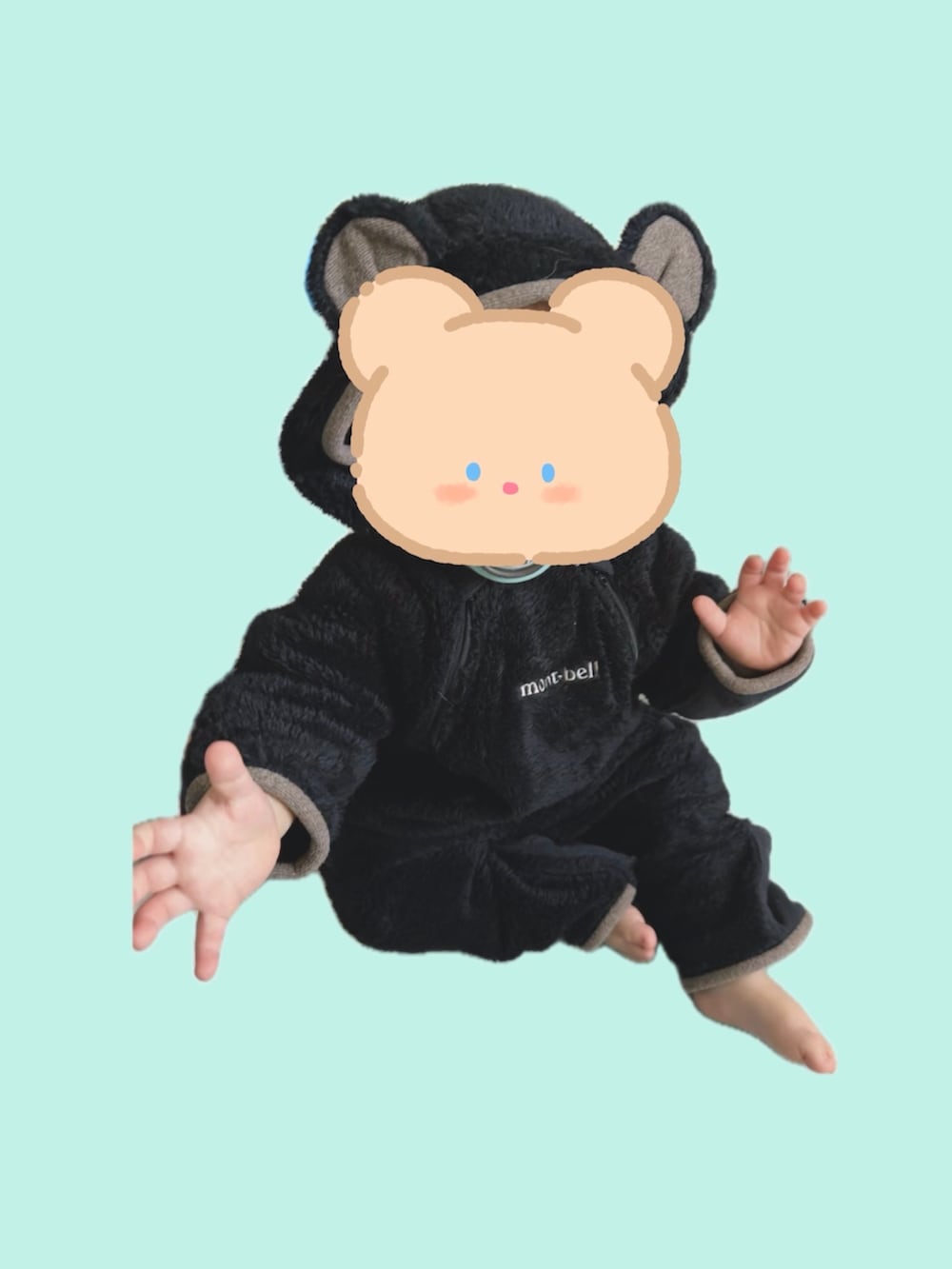 ブラック系のその他ベビーウェアを着用したキッズの冬コーディネートの2枚目の写真