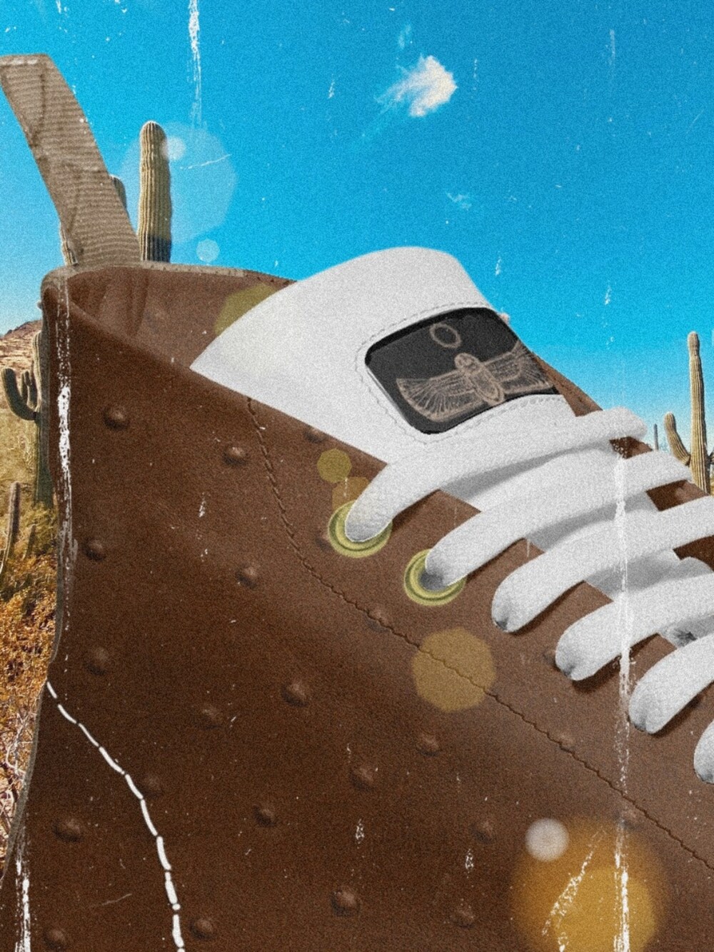 ブラウン系のスニーカーを着用したメンズの秋コーディネートの3枚目の写真