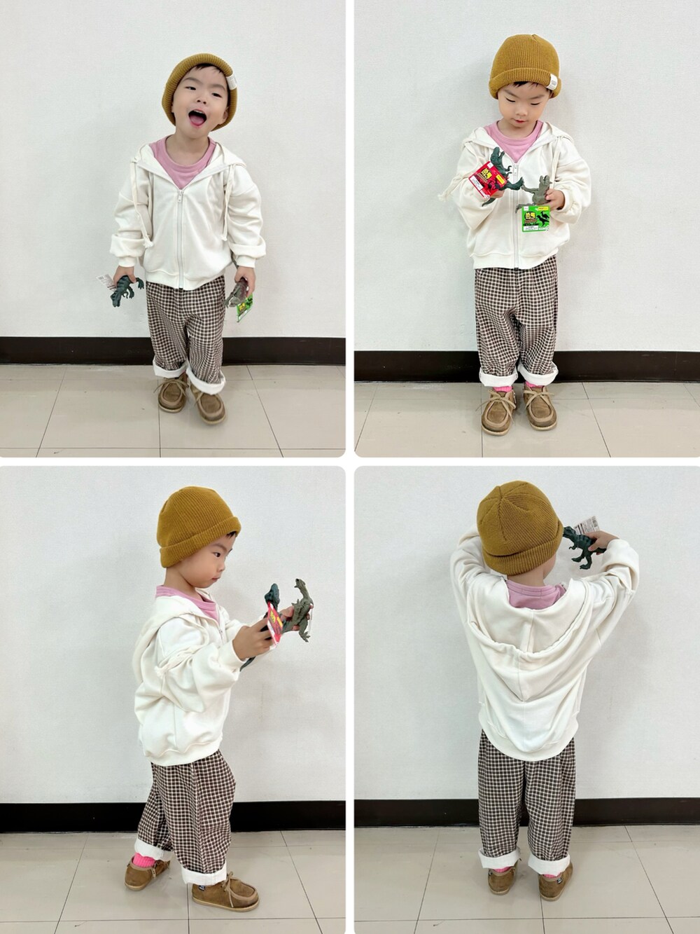 ホワイト系のパーカー、ピンク系のトップス、ブラウン系のパンツを着用したキッズの秋コーディネートの5枚目の写真