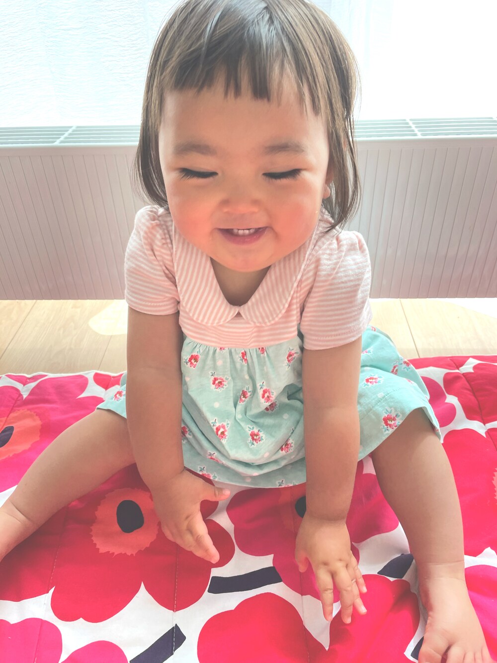 ピンク系のワンピース/ドレスを着用したキッズの夏コーディネートの2枚目の写真