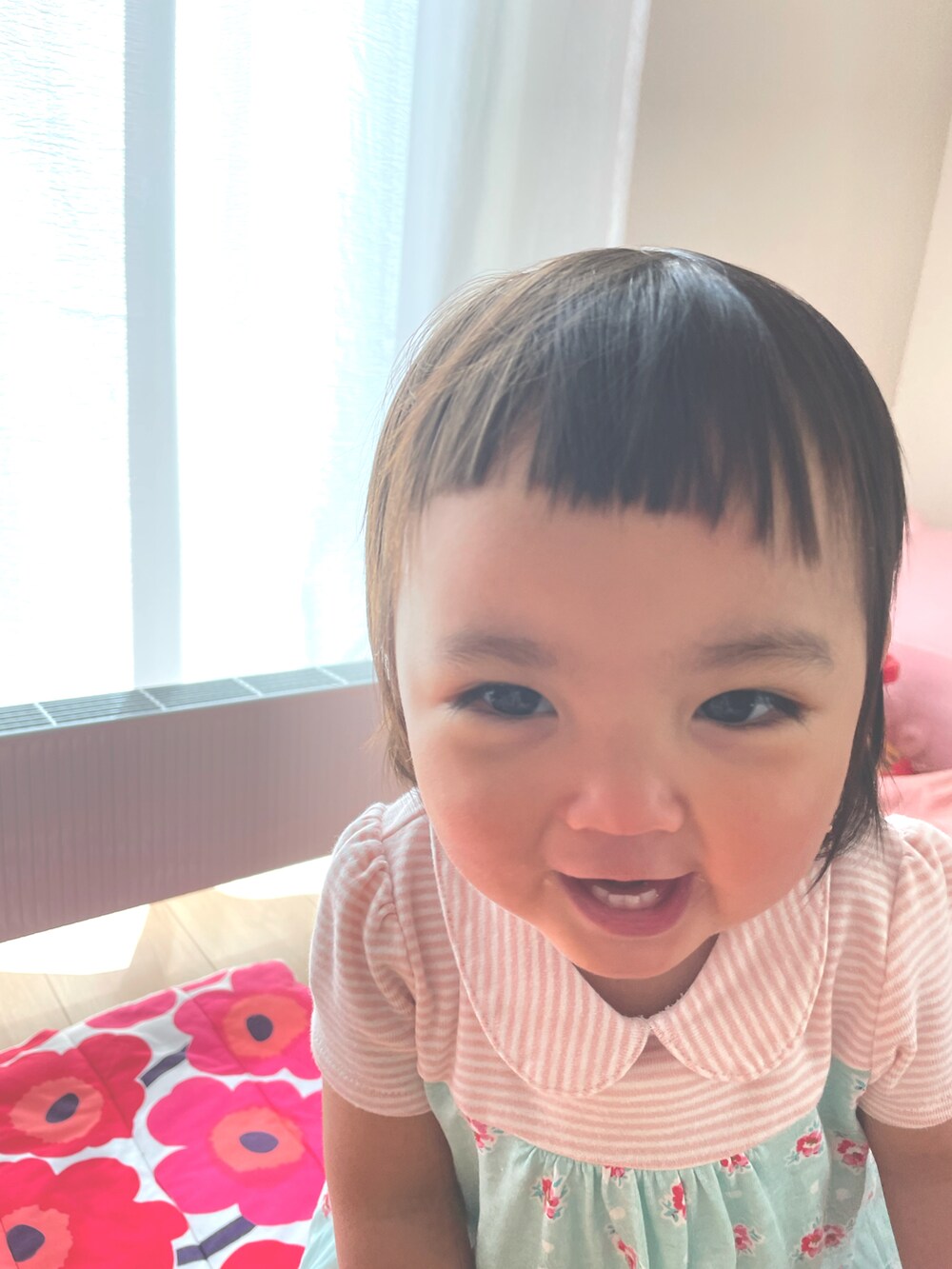 ピンク系のワンピース/ドレスを着用したキッズの夏コーディネートの4枚目の写真