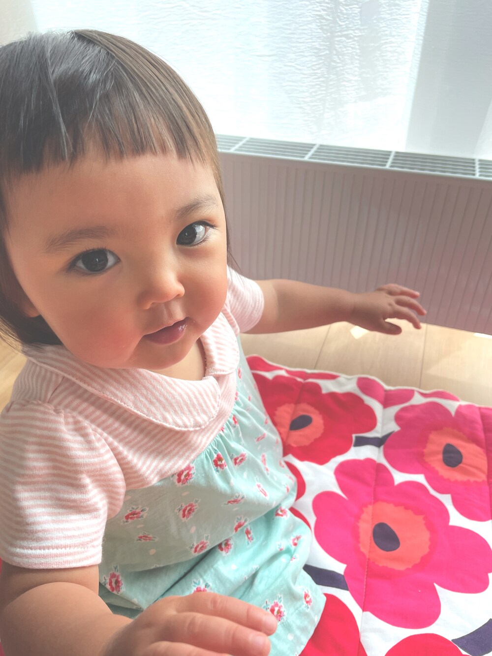 ピンク系のワンピース/ドレスを着用したキッズの夏コーディネートの3枚目の写真