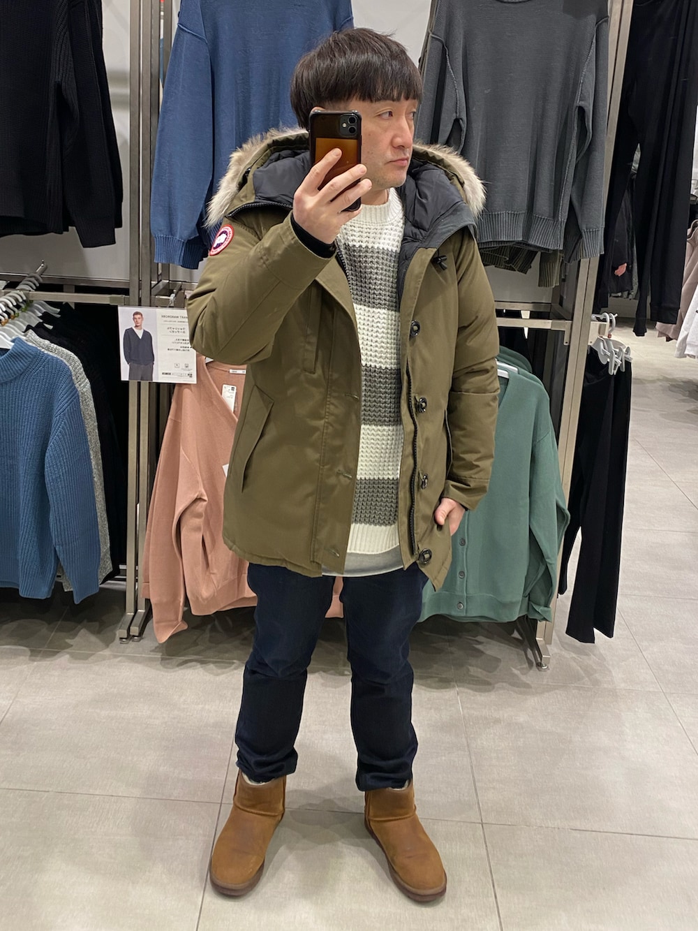 ブラウン系のブーツを着用したメンズの冬コーディネートの2枚目の写真