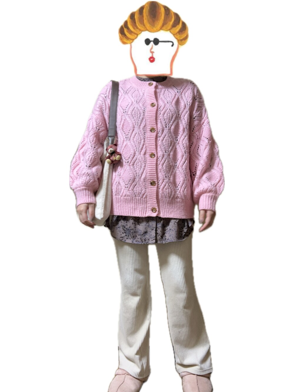 ピンク系のカーディガン/ボレロ、ピンク系のシャツ/ブラウスを着用したレディースの冬コーディネートの2枚目の写真