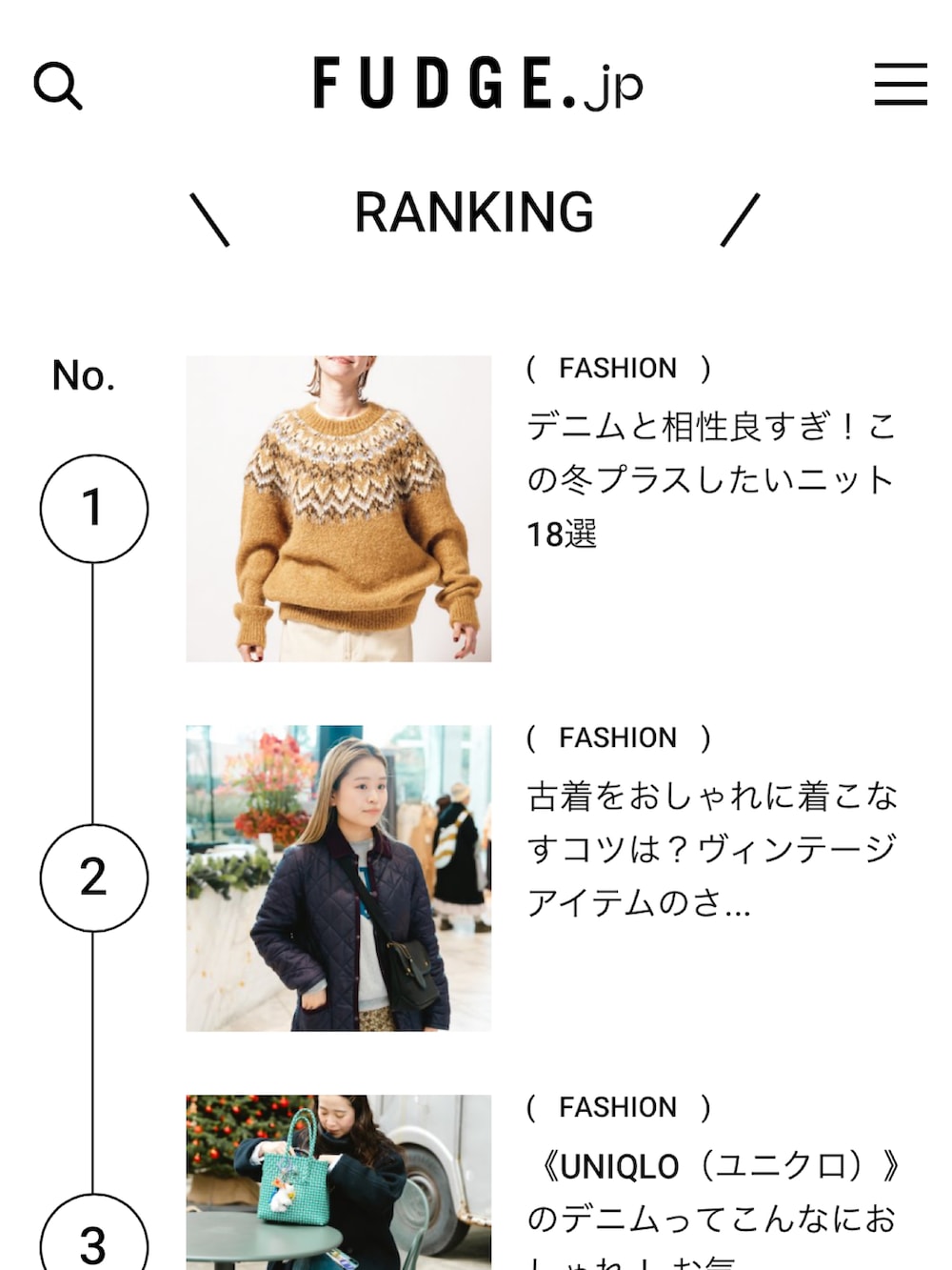 ブラック系のショルダーバッグ、パープル系のジャケット/アウターを着用したレディースの冬コーディネートの5枚目の写真