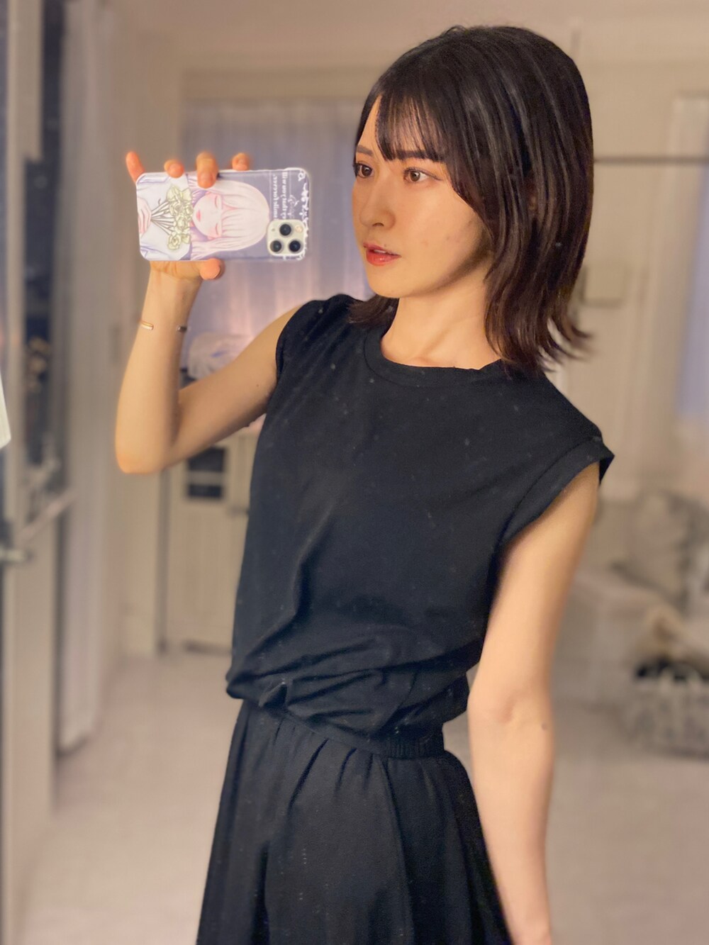 「おでかけコーデ、大人コーデ、大人女子、オールブラック、黒スキニー、スカート、ノースリーブ、プチプラ、きれいめカジュアル、GU、ブルベ冬、タックイン、シンプルコーデ、ワントーンコーデ、オトナカワイイ」｜「GUのアイテム（トップス、ブラック系）」を使った、tamaさん（レディース・162cm）の秋コーディネートの2枚目の写真