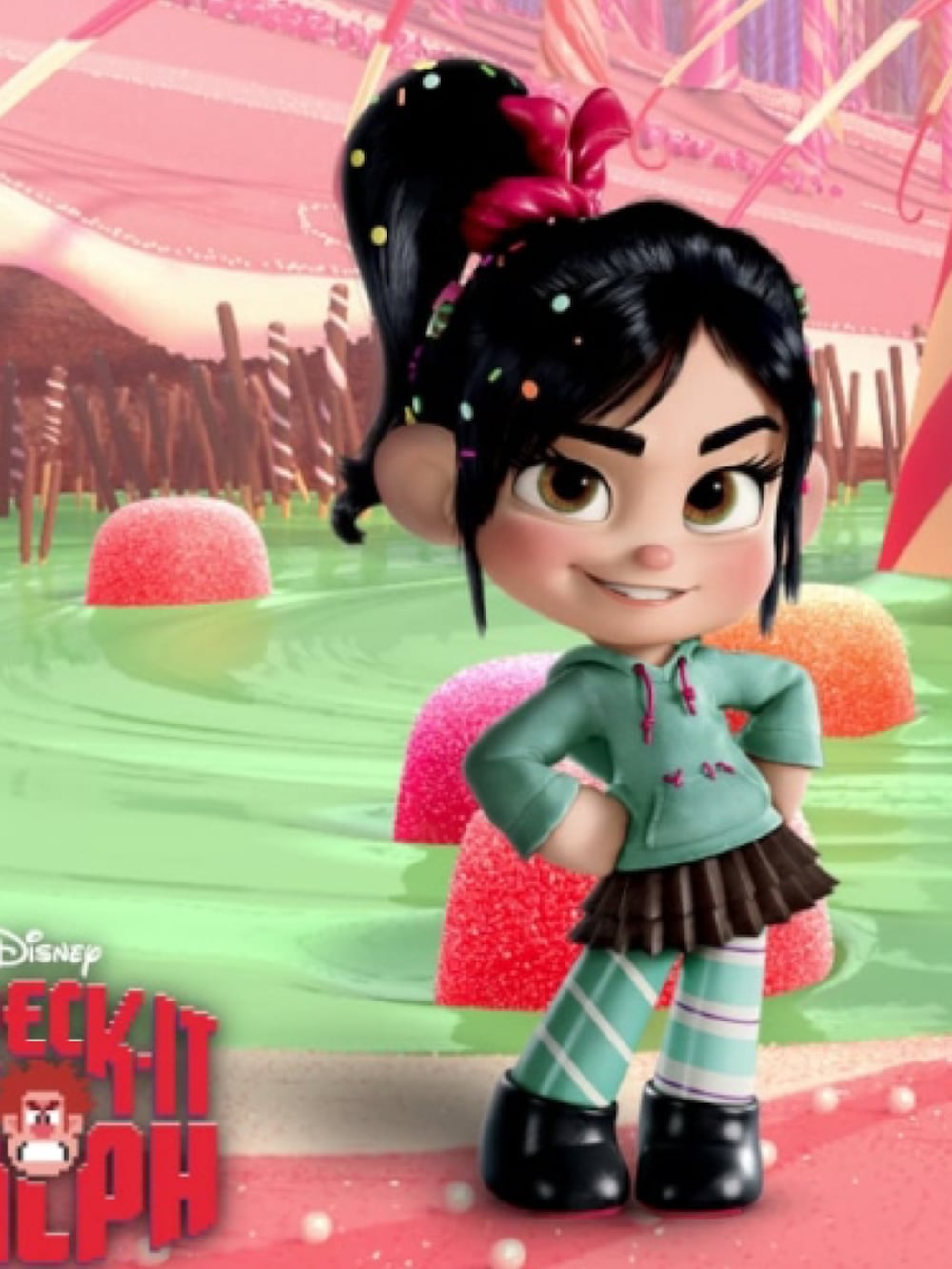 グリーン系のパーカーを着用したキッズの冬コーディネートの3枚目の写真