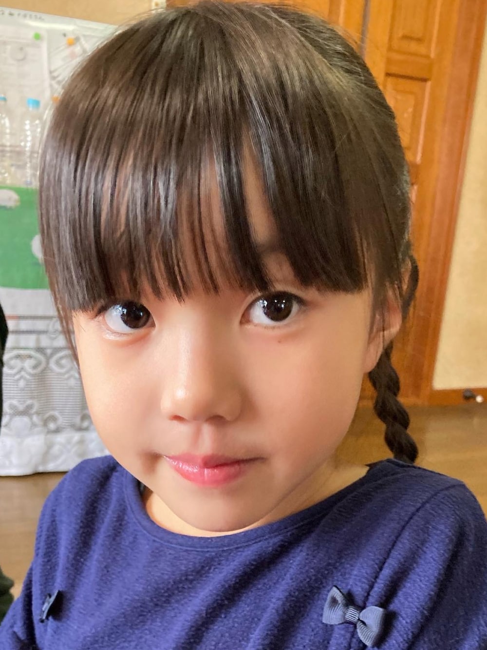 ブラック系のキャップ、その他のその他を着用したキッズの冬コーディネートの2枚目の写真