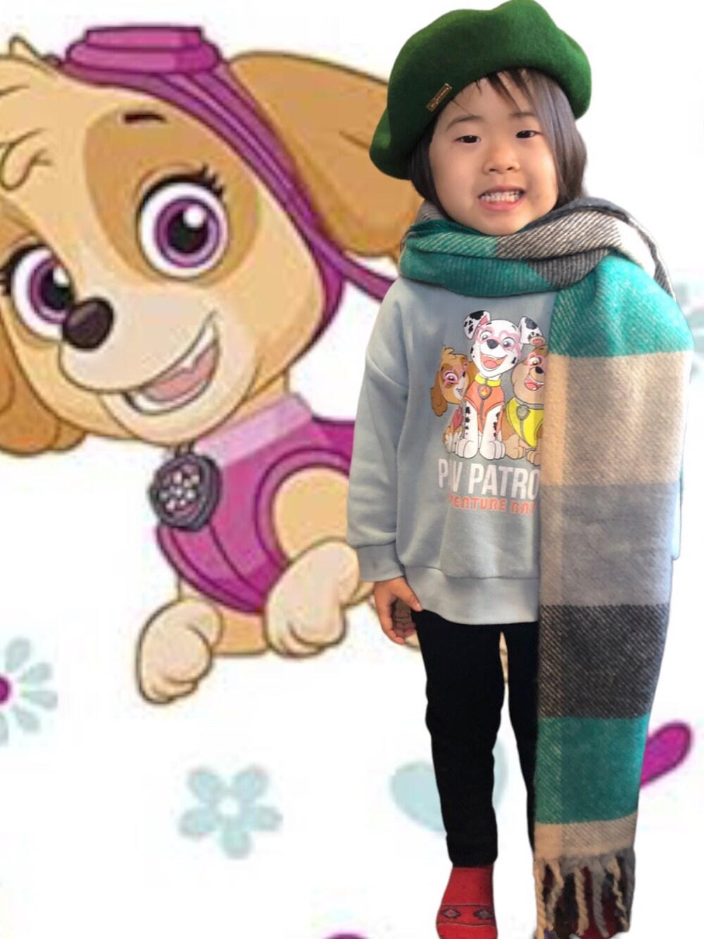 ブラック系のパーカー、ブラウン系のカーディガン/ボレロ、ブルー系のデニムパンツを着用したメンズの冬コーディネートの2枚目の写真