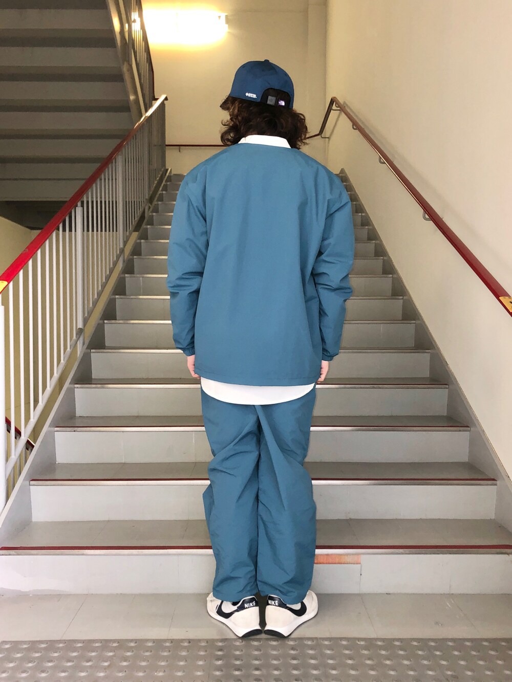 「セットアップ、NIKE、ブルー、キャップ、THE NORTH FACE、シンプルコーデ、春コーデ、URBAN RESEARCH、URBAN RESEARCH DOORS、BURLAP OUTFITTER」｜「BURLAP OUTFITTERの『別注』BURLAP OUTFITTER×DOORS　SupplexNylon PANTS2（その他パンツ、ブルー系）」を使った、さとすけさん（メンズ・164cm）の春コーディネートの4枚目の写真