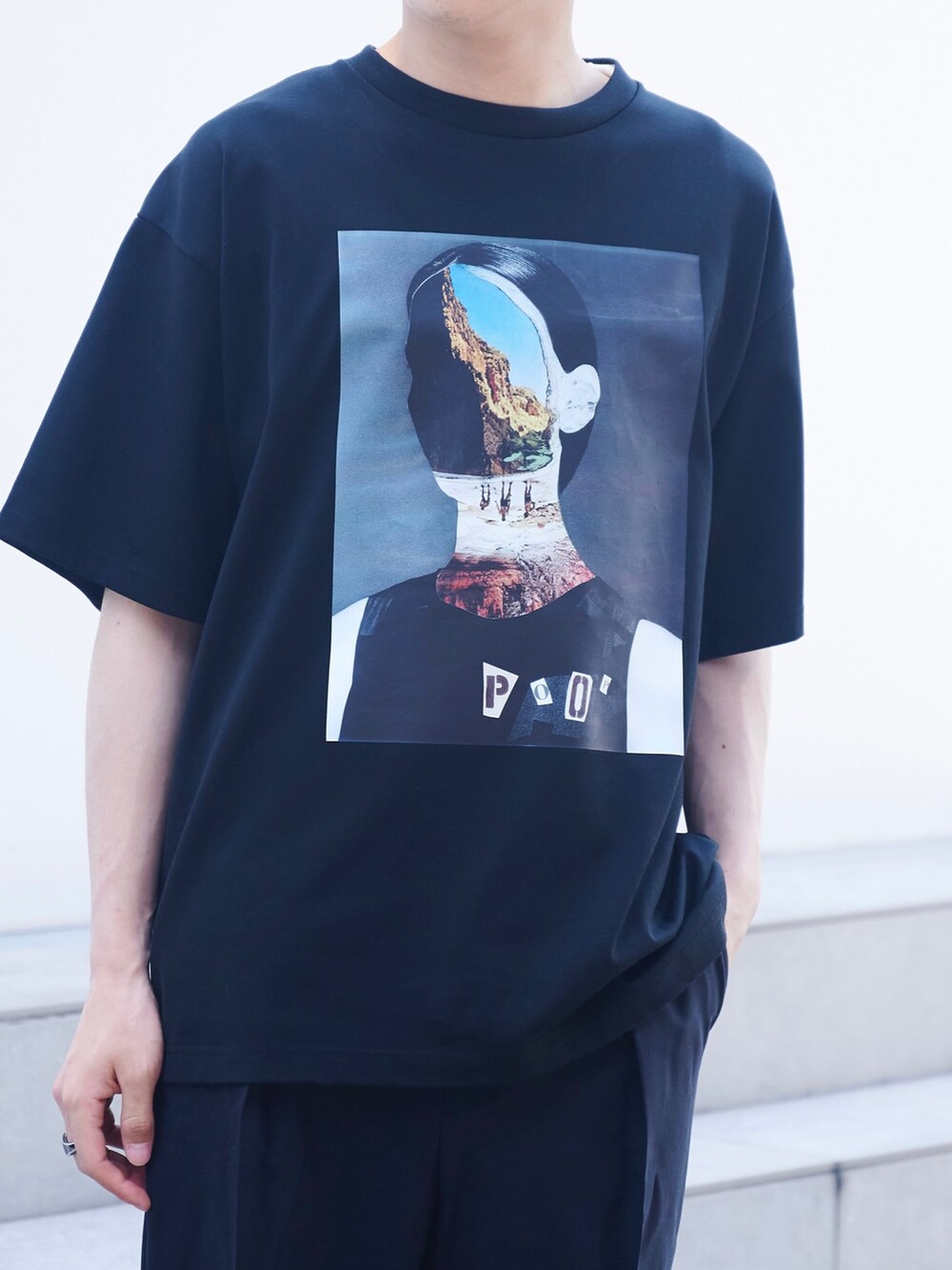 「プリントT、グラフィックＴ、Tシャツ、ブラック、STUDIOUS、カジュアル」｜「STUDIOUSのORANGE POOPLEグラフィックTEE（Tシャツ/カットソー、ブラック系）」を使った、白鳥巧史さん（メンズ・170cm）の夏コーディネートの5枚目の写真