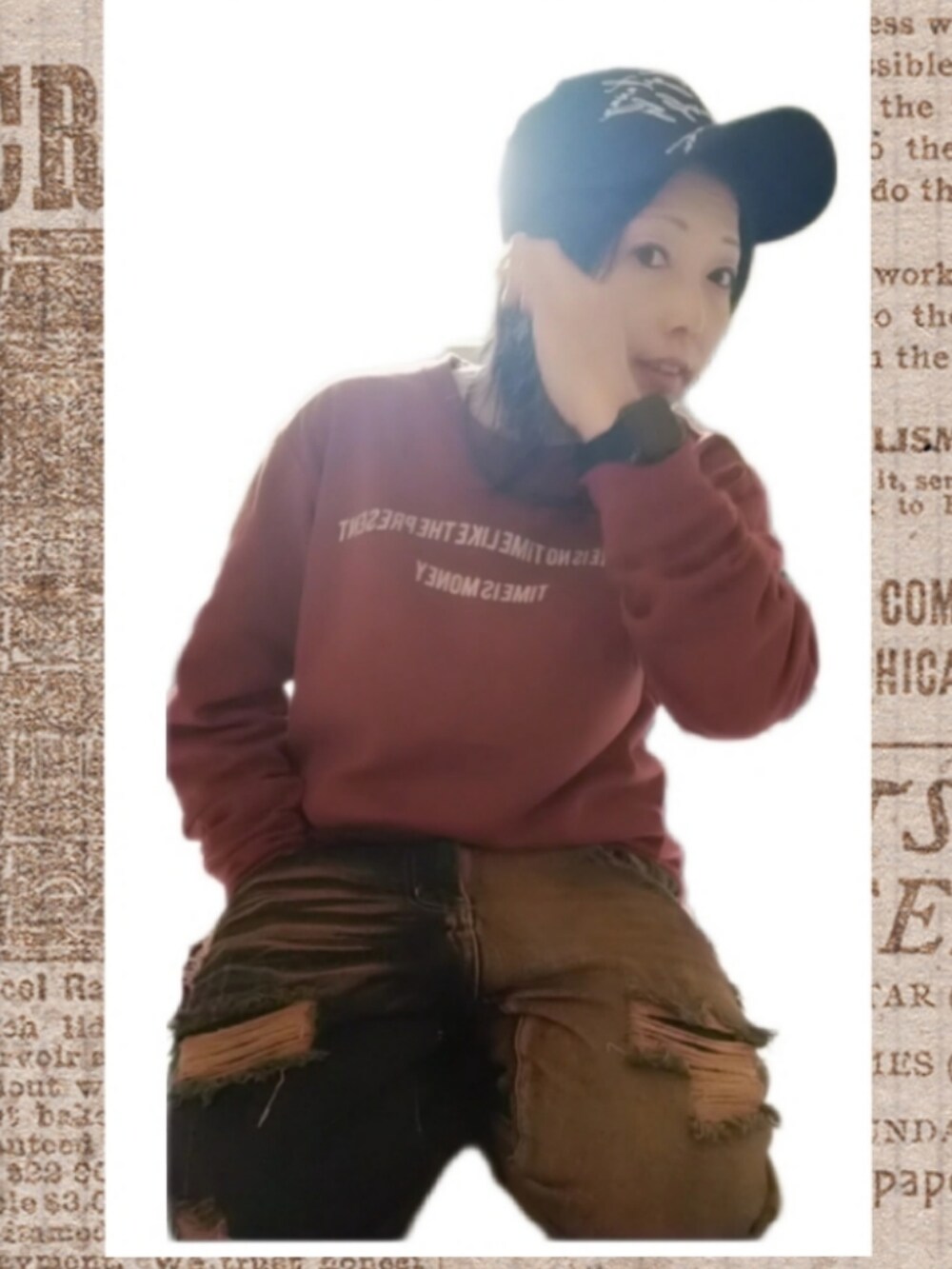 ゴールド系のデニムパンツを着用したレディースの秋コーディネートの4枚目の写真