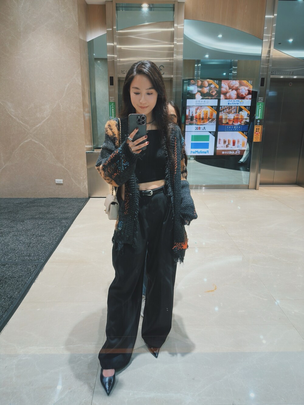 「PAZZOのアイテム（パンツ、ブラック系）」を使った、Moo Lee🇹🇼さん（レディース・160cm）の冬コーディネートの2枚目の写真