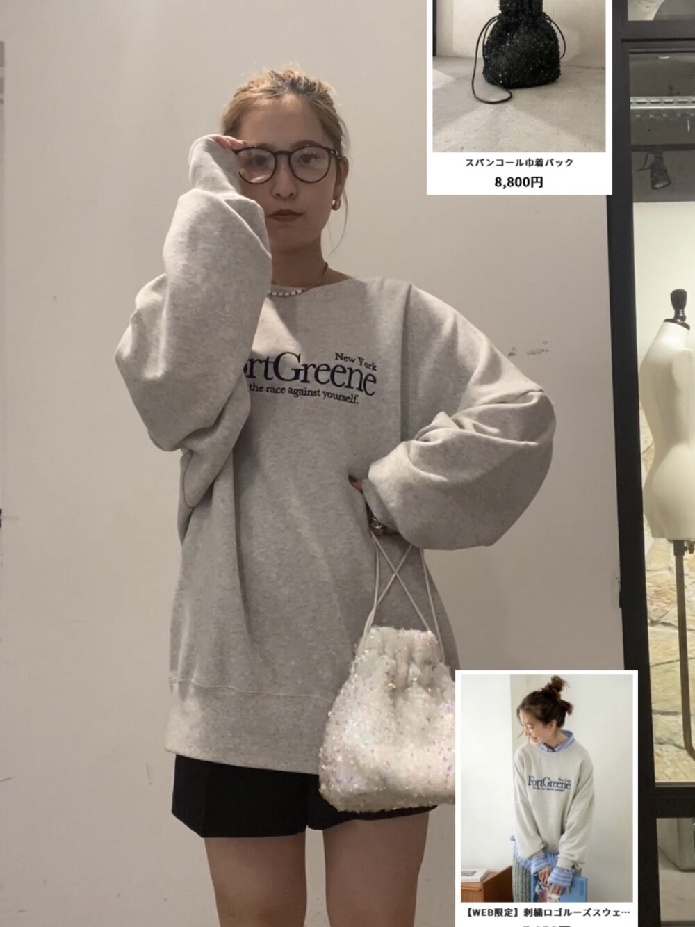 ブラック系のブーツ、ホワイト系のハンドバッグ、グレー系のスウェットを着用したレディースの秋コーディネートの2枚目の写真