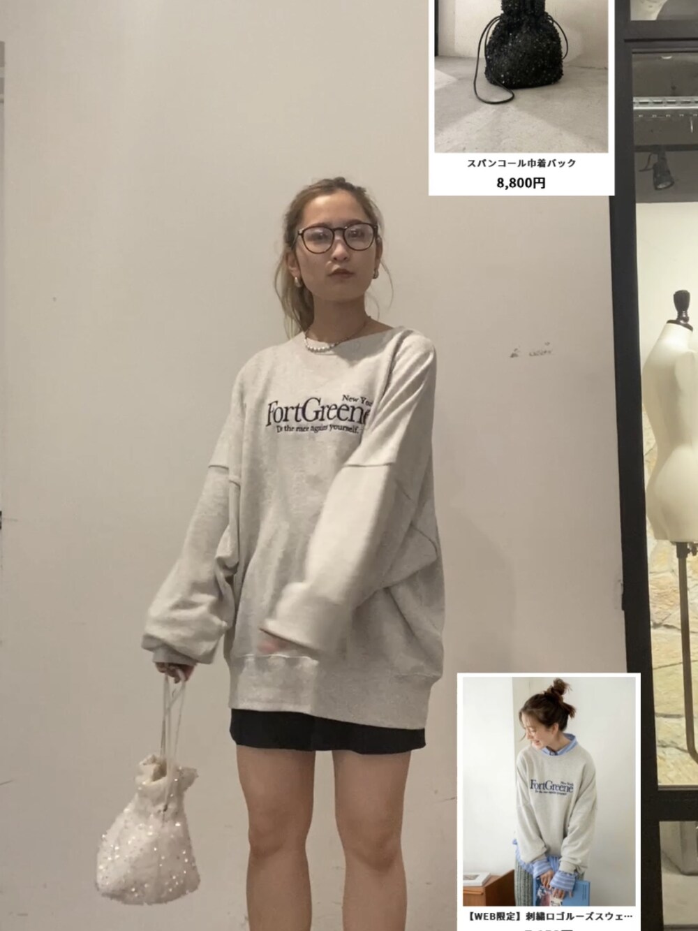 ブラック系のブーツ、ホワイト系のハンドバッグ、グレー系のスウェットを着用したレディースの秋コーディネートの3枚目の写真