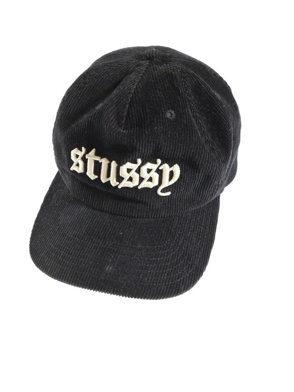 ブラック系の帽子を着用したメンズの春コーディネートの2枚目の写真