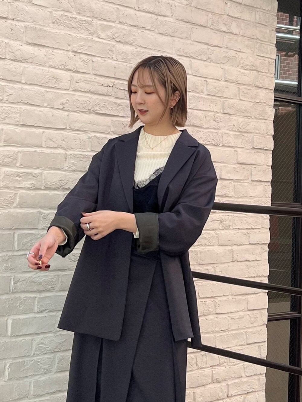 「PUBLIC TOKYOのウーリートラペーズスカート（スカート、グレー系）」を使った、福田優花さん（レディース・163cm）の秋コーディネートの5枚目の写真